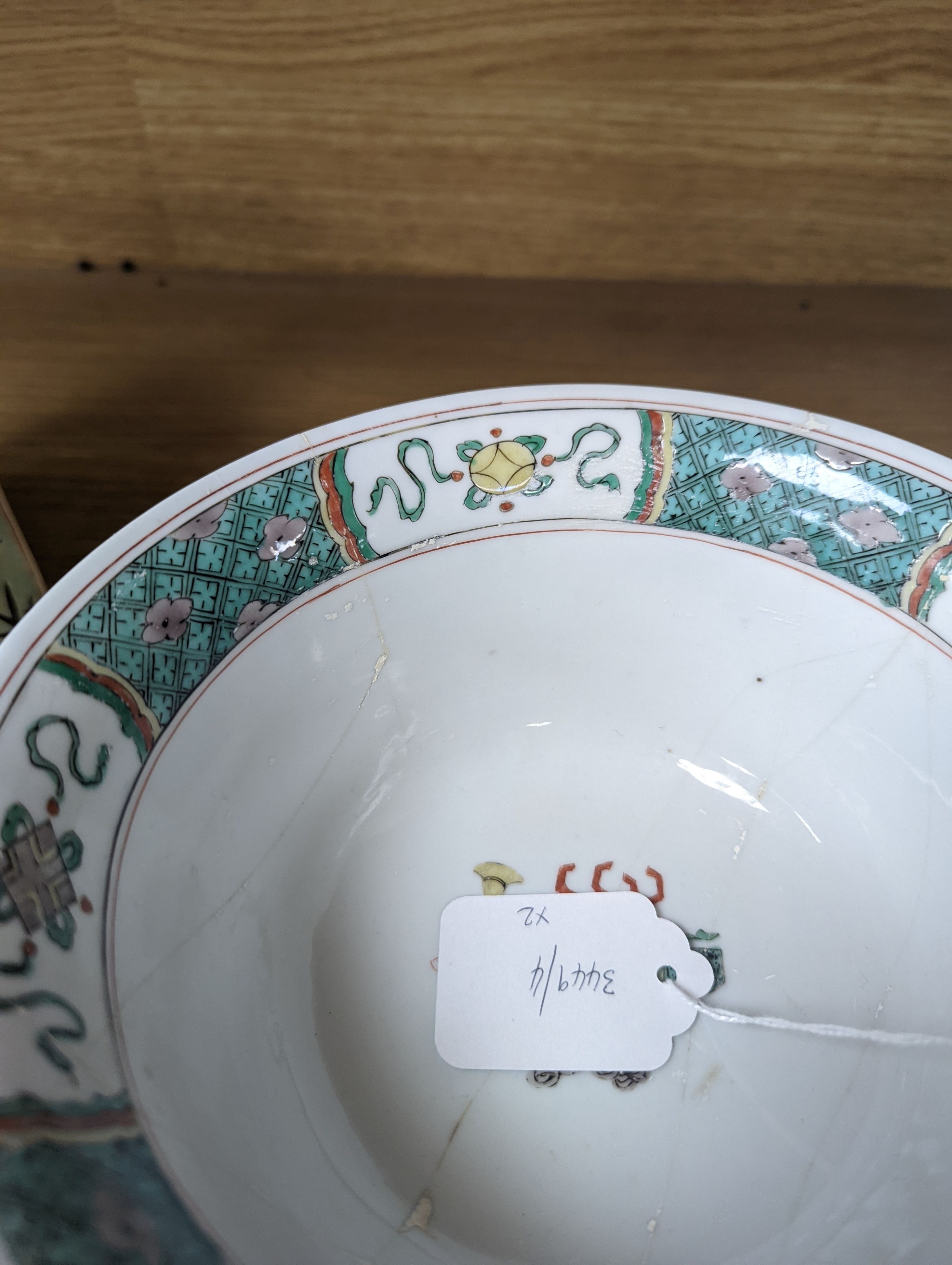 A Kangxi famille verte bowl, 20cm (a.f.) and a Chinese Dowager Empress-pattern pillow with dragons